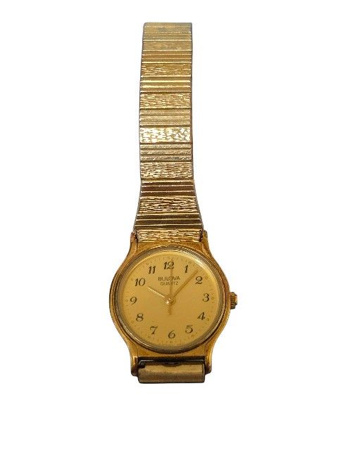 womans goldtone Bulava watch with stretch band 1990s 
