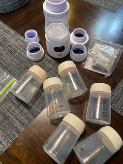 Lot of milk storage containers and portable bottle warmer