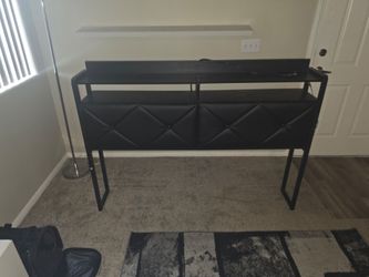 Black headboard with plugins