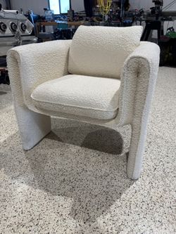 Eichholtz Toto bouclé cream armchair