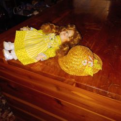 Vtg. 1991 Seymour Mann  Collectible Bisque Connosaire Doll With Flower Basket And Straw Hat.