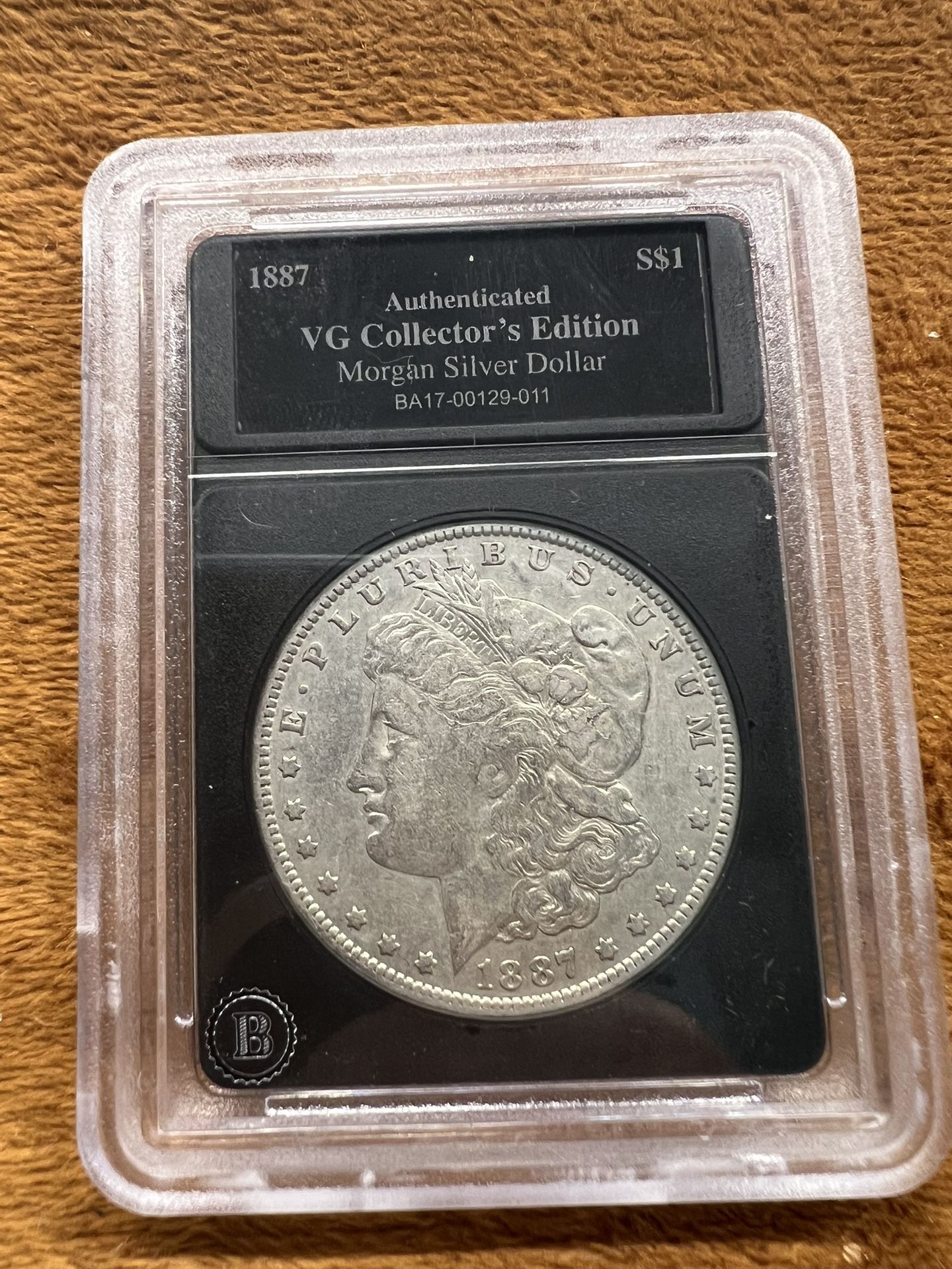 1887 O Silver Morgan Dollar