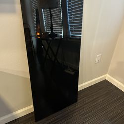 Black rectangular glass table top