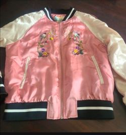 Large Vintage This pink and cream satin bomber jacket features embroidered floral and bird details on the chest, paired with black-and-white striped