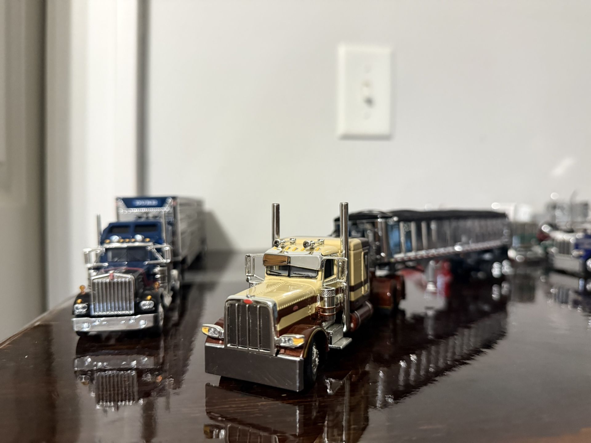 Several 1/64 Scale Dcp Trucks