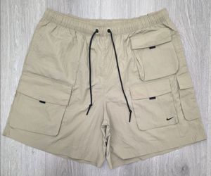 Nike Tech Woven Cargo Utility Parachute Khaki Shorts HJ0677-297 Men’s Size Large NWT MSRP $115