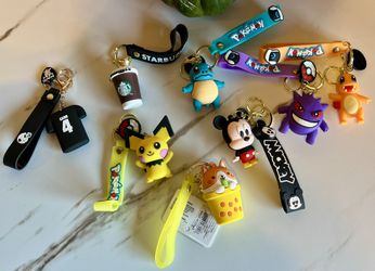 Random Keychains and Psyduck Enamel Pin