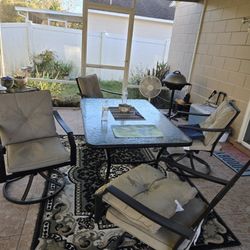 Patio table clash, top metal frame and four chairs with the cushions