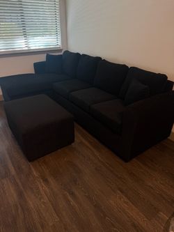 NEW black sectionals with free ottoman