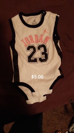 Baby clothes bibs and bottles