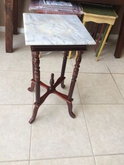 100 year old antique marble table