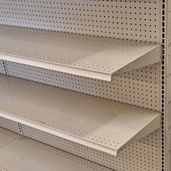 Gondola  shelves lozier brand 60inches in height beige color  w/16 inch base  $200