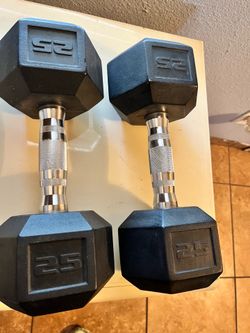 (2) 25 lbs weights