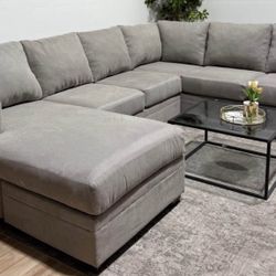 Grey Living Spaces Sectional Couch - Delivery available