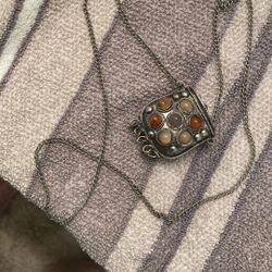 Necklace with secret compartment