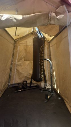 Outslayer Punching bad with everlast stand and tent storage