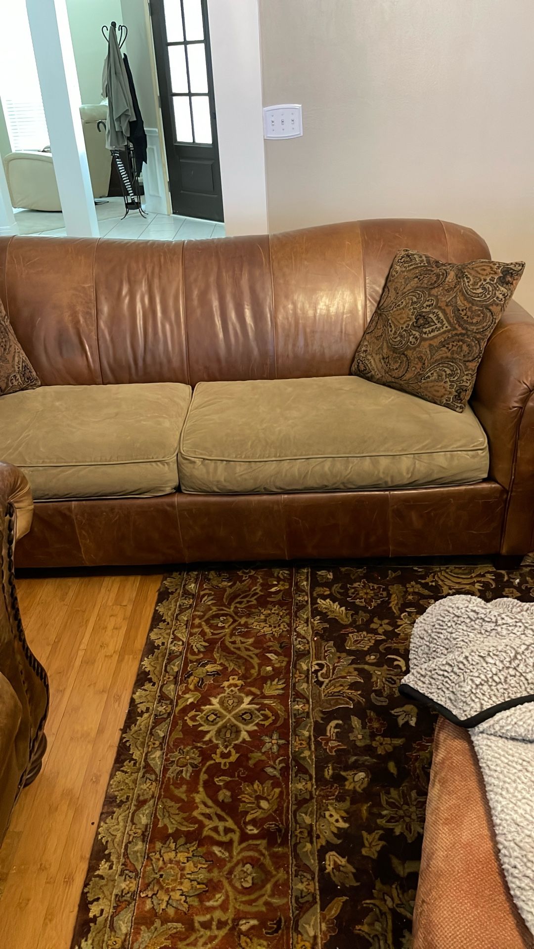 Sofa And Two Leather Chairs