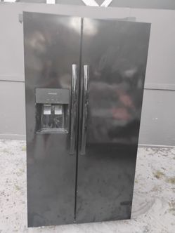 Frigidaire Side-by-Side Refrigerator with Ice Dispenser
