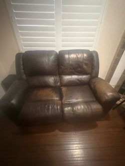 Brown Leather Reclining Loveseat