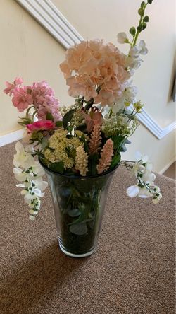 Large vase full of flowers