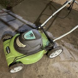 Green Works Electric Plug In Lawn Mower.