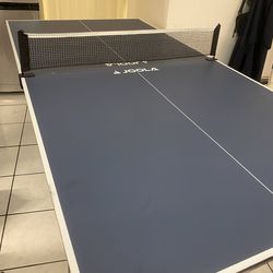 Mid sized ping pong table.