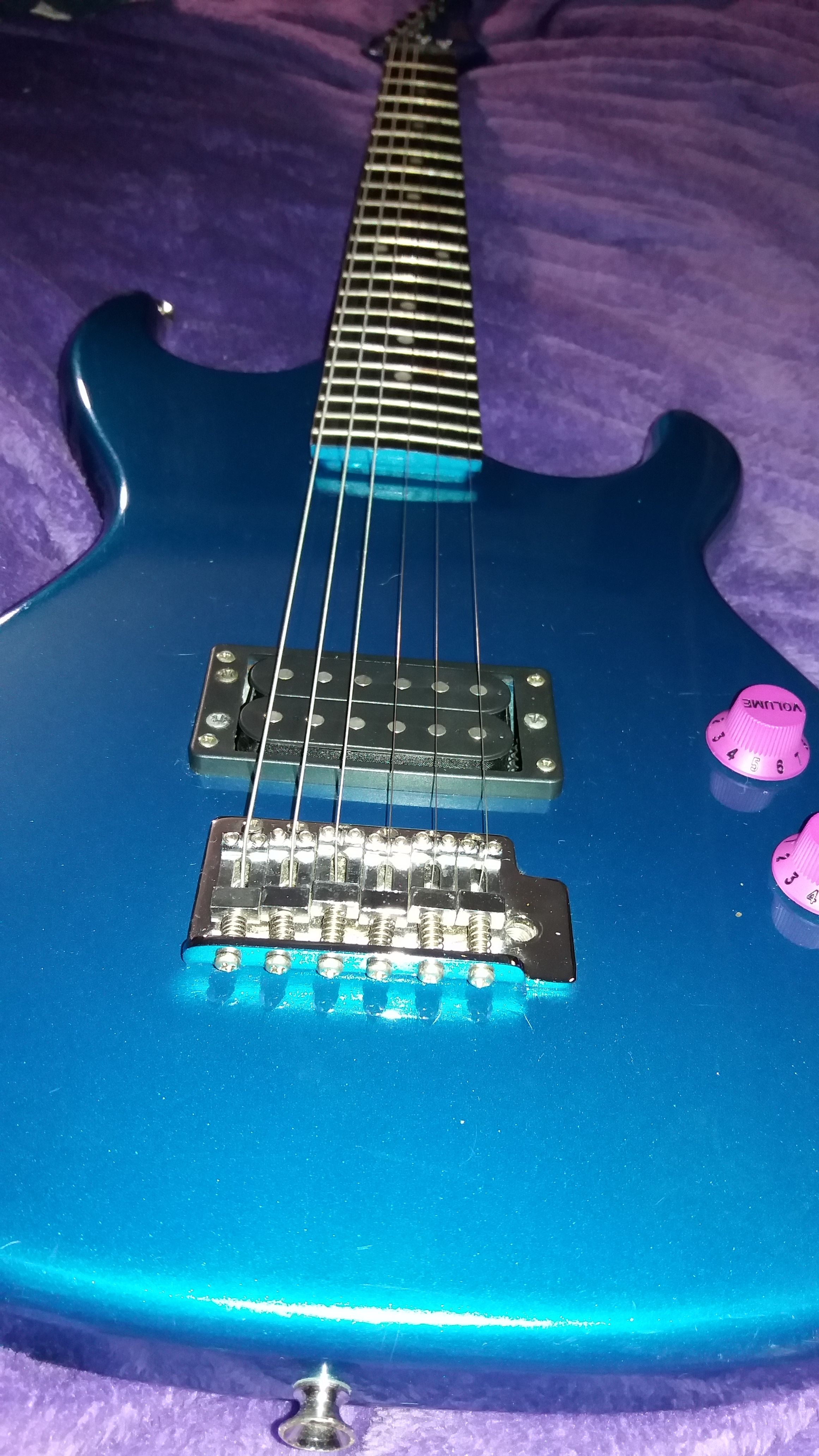 Teal Tanara electric guitar