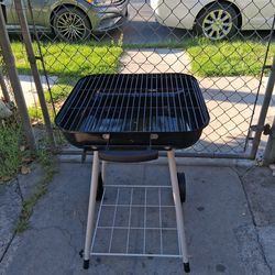 charcoal grill.  18"×18"×28" tall.