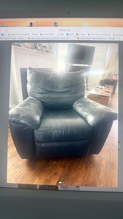 Ultra comfort black leather armchair with manual recline and footrest