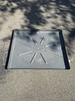 Washer pad with drain