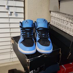 University Blue And Black Jordan 1s Size 9.5