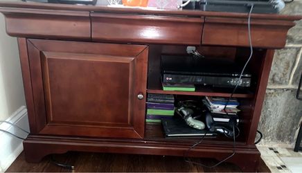 TV stand for sale - solid wood! Dark cherry color - 42” W x 26-1/2” H