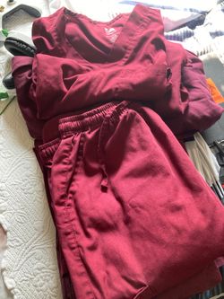 4 pairs of maroon scrubs
