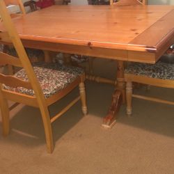 Pine Wood Dining Table, Used But Still Nice And four matching chairs.