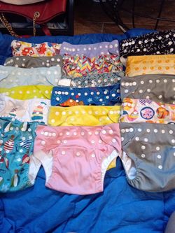 Baby girl or  toddler girl or  baby boy or toddler boy washable reusable cloth diapers with adjustable buttons for sizing