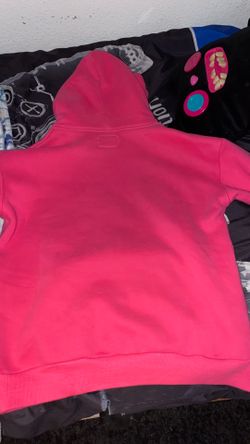 Pink spider hoodie and red bape shirt