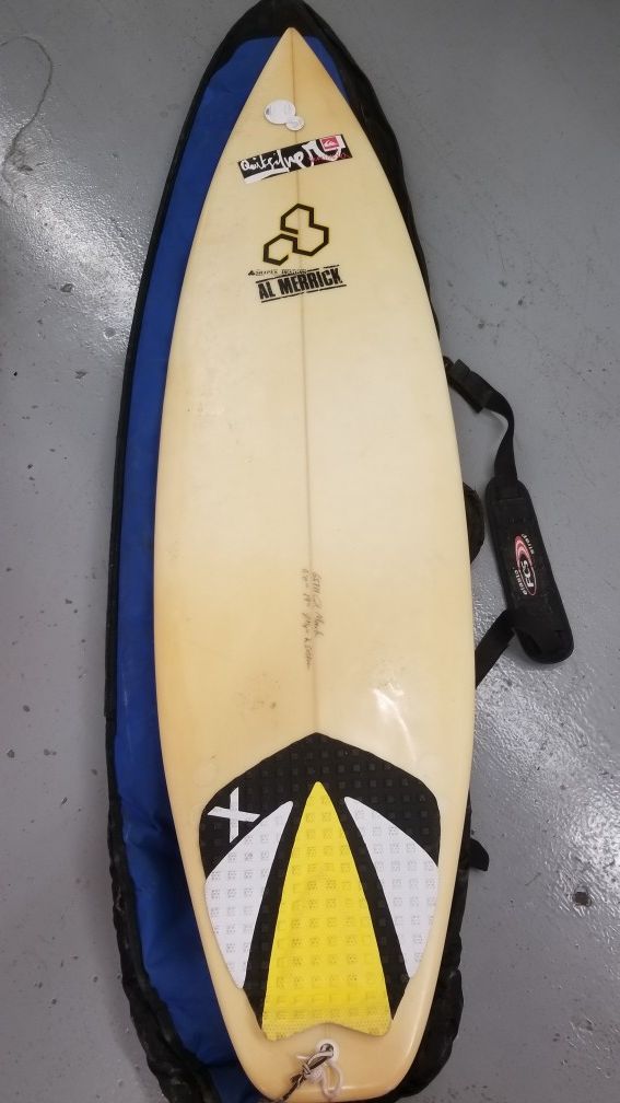 Channel Islands surfboard with insulated travel case