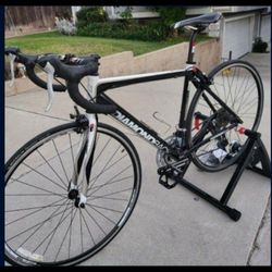 Diamondback Podium Size Large Wheels 700cc Speeds 24 Light Weight Super Fast With Trainer And Led Lights 
