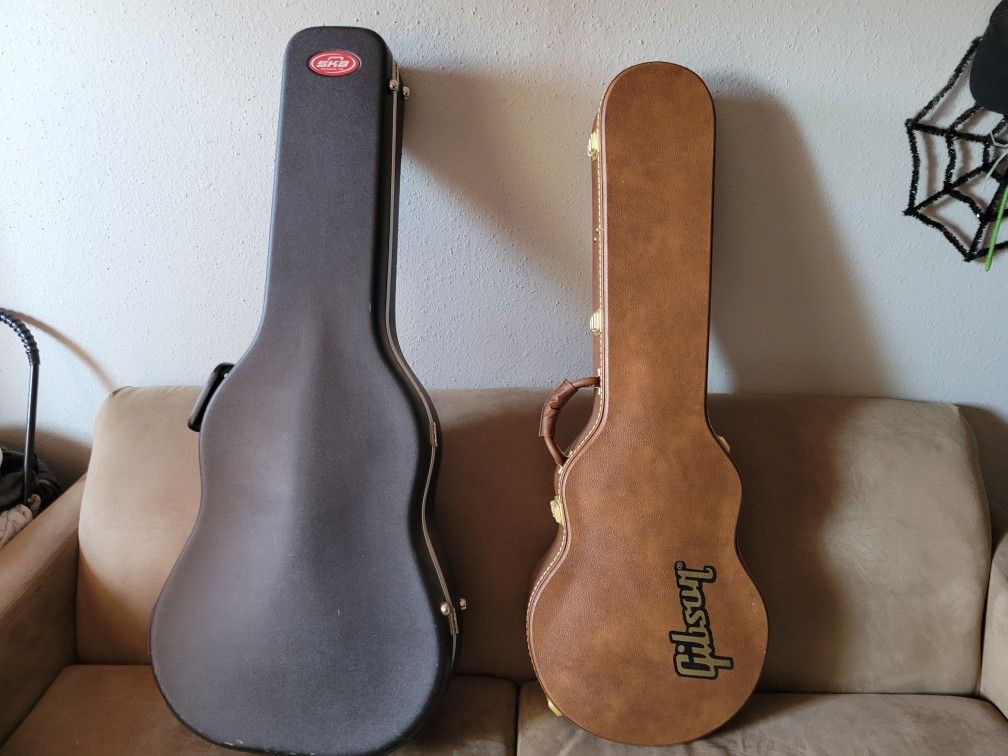 Three guitar cases for sale