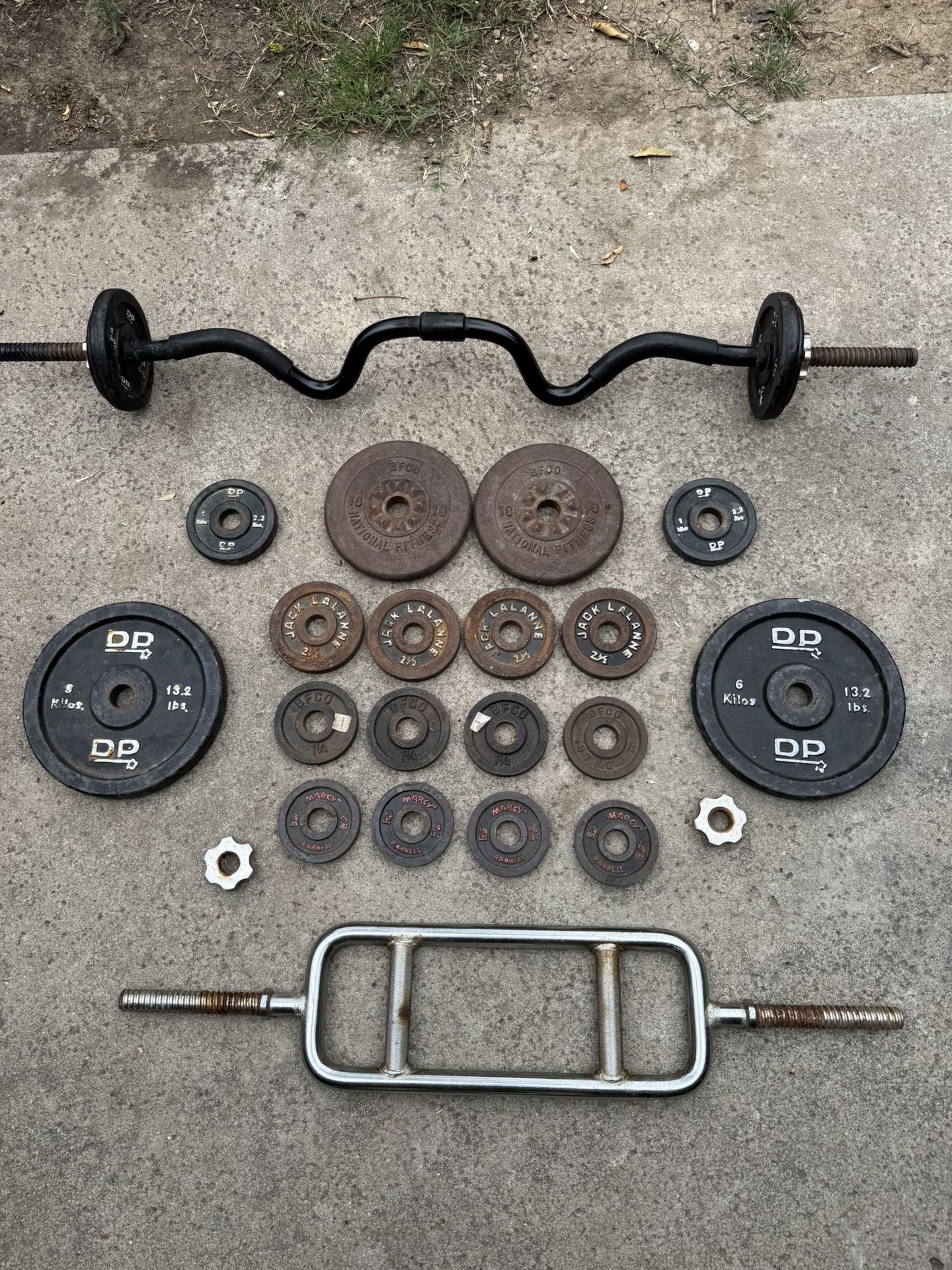 Standard Weight Set Around 80 Lbs + 2 Bars