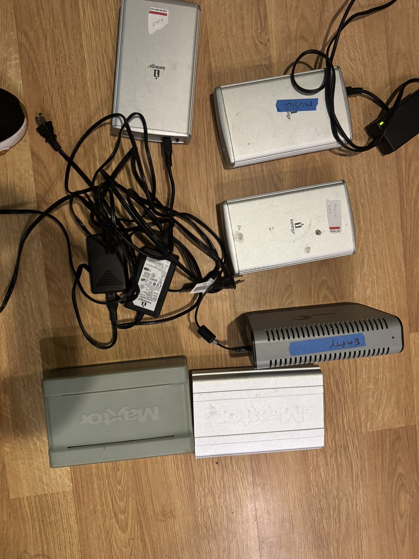 6 external hard drives total. 1 seagate, 2 maxtor, 3iomega. All work. Some power cords are missing.