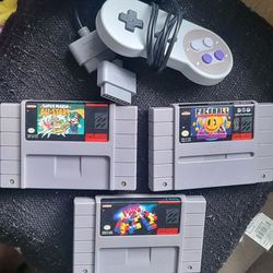 Super Nintendo Games And 2 Controllers