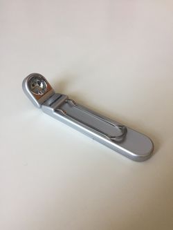 Elegant Small Folding Flash Light with clip. Very convenient. Lets you reach with light unreachable areas.