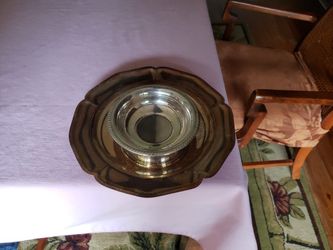 Silver serving platter with bowl