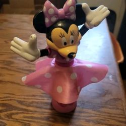 Disney Store Minnie Mouse SpinningPink poke dot