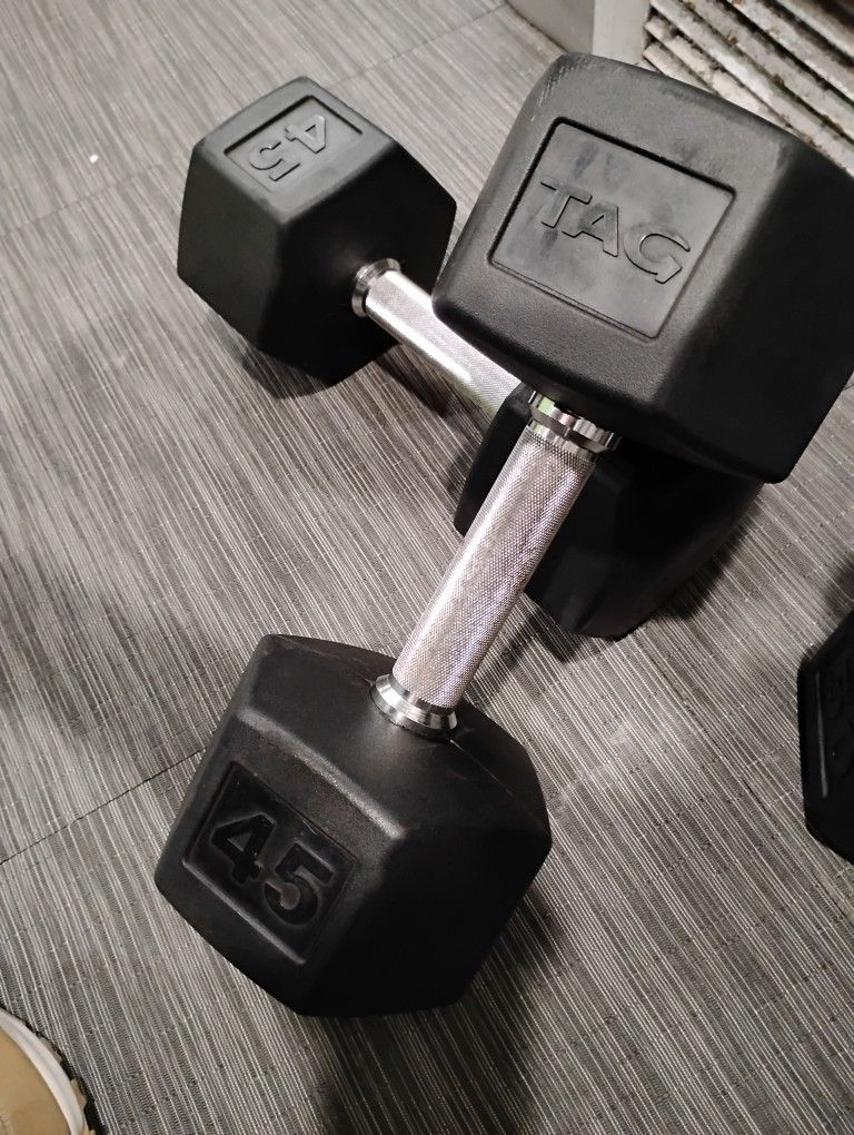 Two TAG 45 LB DUMBBELLS 