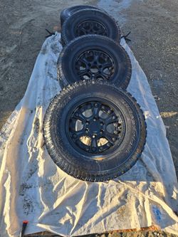 BFGoodrich All-Terrain T/A Tires on Black Wheels – Set of 4