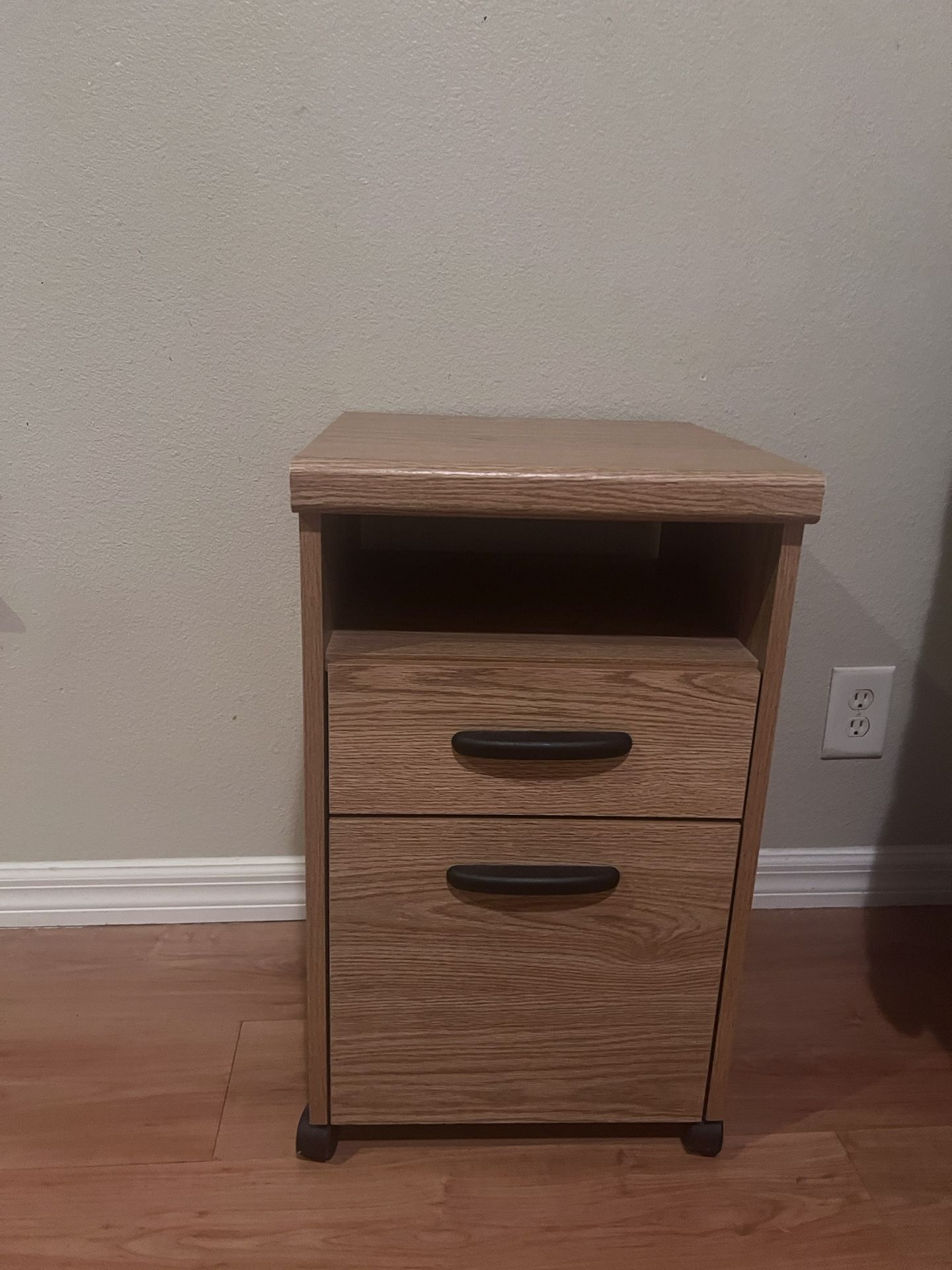 Rolling file cabinet with shelf 15.5" wide, 16" deep, 26" tall.