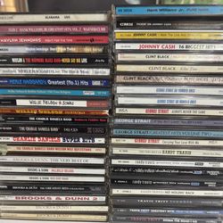 Over 160 country CDs near Mint Conditioni