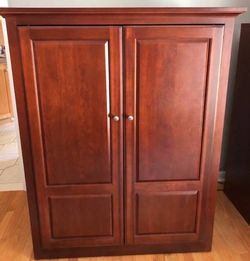 Cabinet (55.5”. Tall  44.75” wide  24” deep)